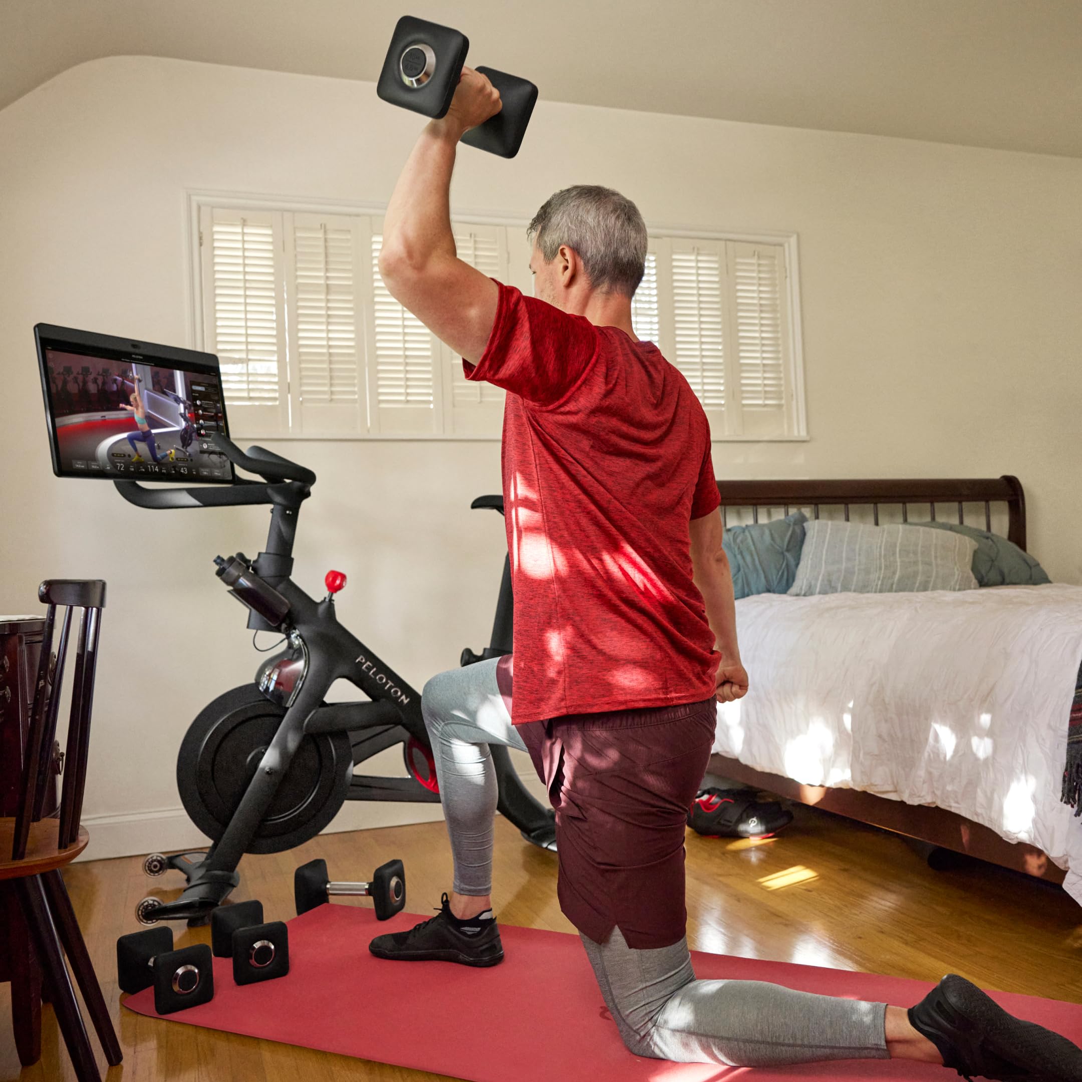 Peloton Bike+ | Indoor Stationary Exercise Bike with 24” HD, Anti-Reflective Rotating Touchscreen, Black